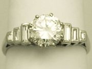 A FINE ANTIQUE FRENCH 1.10 CARAT DIAMOND AND 18 CARAT GOLD DRESS RING